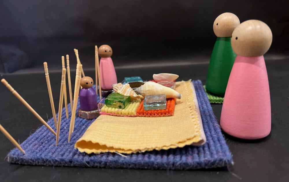 toy parents and children meeting around a table